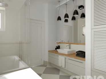 Ściana lustrzana nad szarymi szafkami z prostokatna uwmywalką,czarne lampy wiszące nad łazienkową umywalką,biało-szara posadzka ułożona w duże karo (26026)
