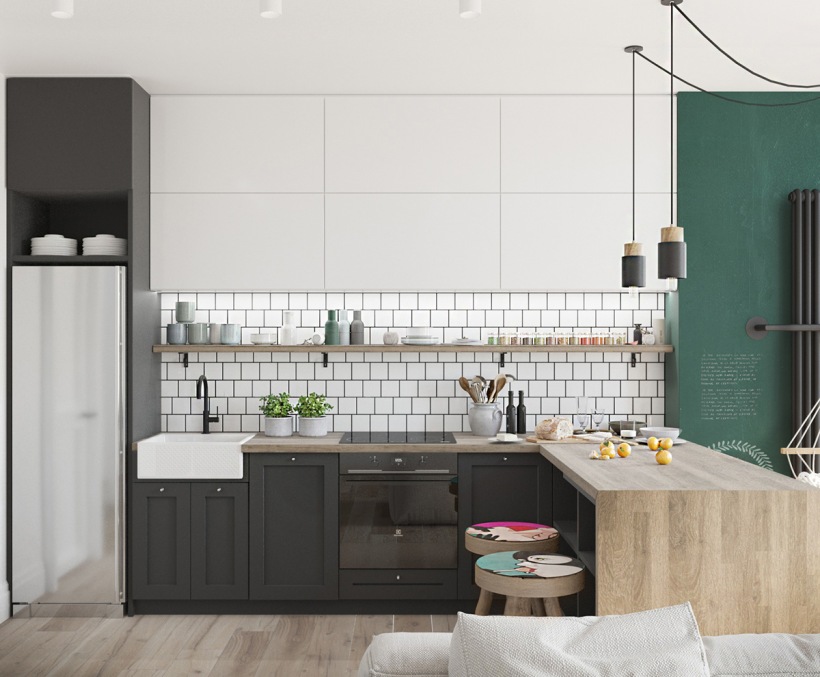 Biało-czarna kuchnia z drewnem i zieloną ścianą