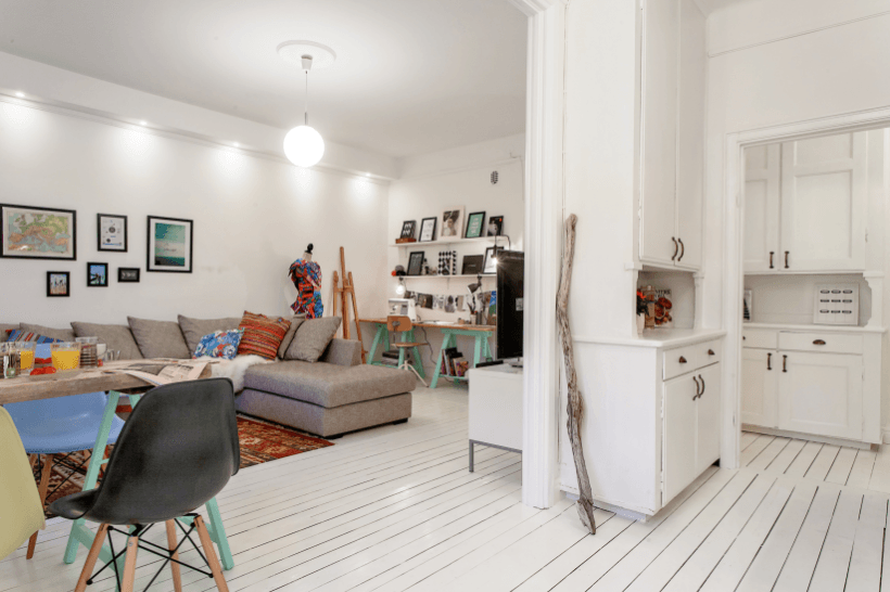 Jak urządzić otwartą przestrzeń kuchni z salonem w stylu skandynawskim ?