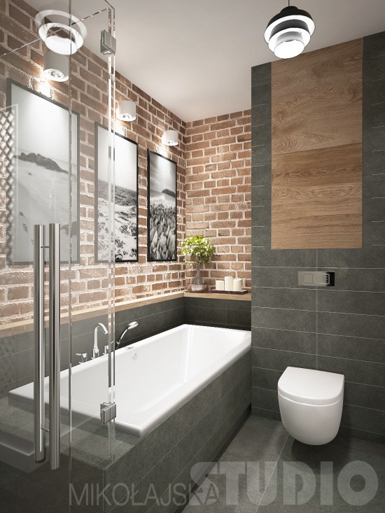 Łazienka w stylu loft z czereoną cegłą na ścianach i szarymi płytkami