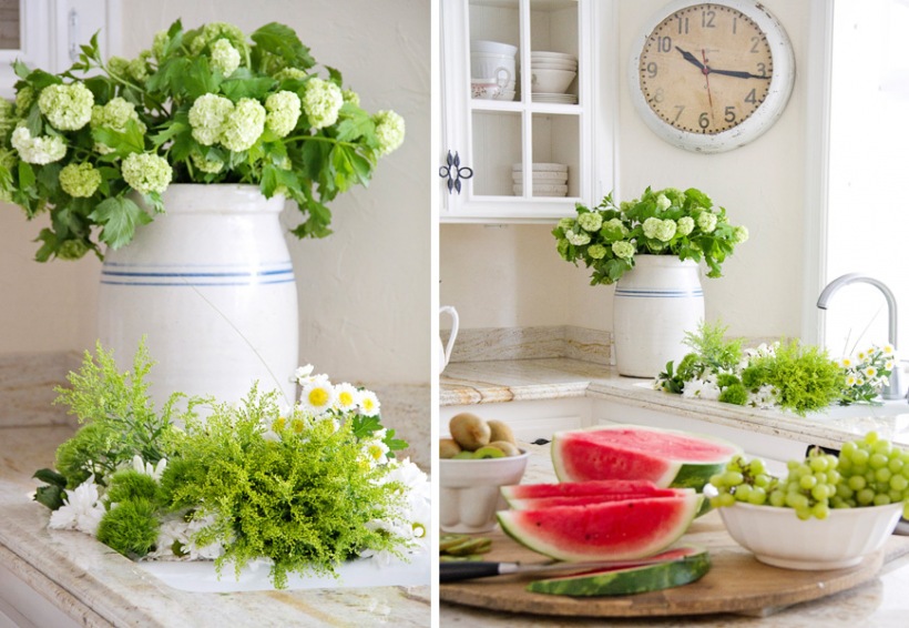 Białe kwiaty, arbuzy i winogrona w dekoracji tradycyjnej białej kuchni