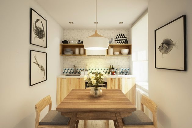 Meble kuchenne z naturalnego drewna,biała cegła na ścianie,biało-czarne plakaty i czarne dodatki w skandynawskim stylu