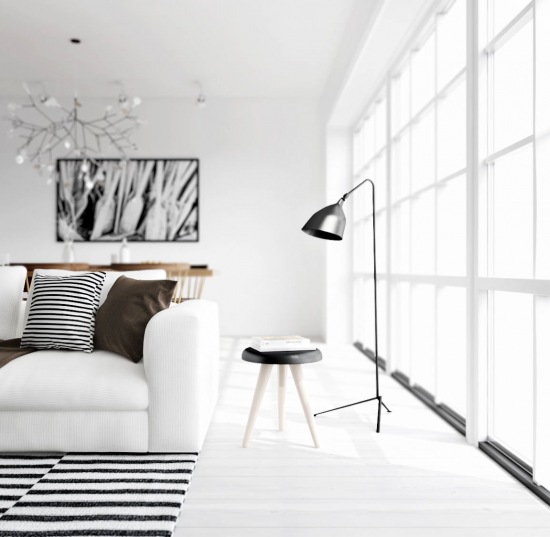 Nowoczesna lampa krzak,srebrna lampa podłogowa,biała sofa i dywan w czarno-białe paski