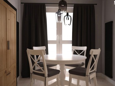 Okrągły stolik to zawsze dobra opcja szczególnie w mniejszych wnętrzach. Jadalniane meble pomalowane białą farbą...