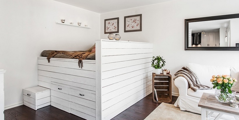 Pomysł na zabudowę sypialni w salonie z rustykalnymi detalami w skandynawskim stylu