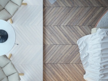 Drewniane deski na podłodze wyglądają wyjątkowo ładnie i upiększają całą sypialnię. Meble wybrano w bieli oraz jasnych...