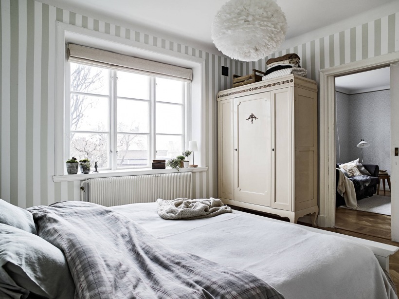 Stylowa szafa w skandynawskiej sypialni