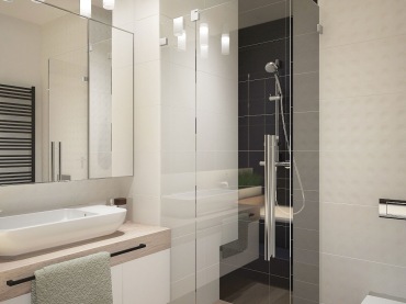 Aranżacja łazienki jest całkiem nowoczesna i schludna. Przezroczysta kabina prysznicowa podkreśla ten styl oraz spełnia...