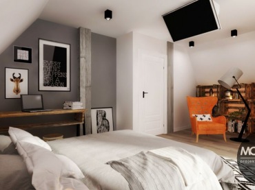 Przestronną sypialnię urządzoną w chłodnej kolorystyce bieli oraz szarości urozmaicono znacznie oryginalnym meblem!...