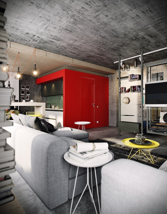 Otwarta przestrzeń loftu z betonowymi ścianami i czerwono-szarą kuchnią