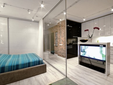 Sypialnia w otwartej zabudowie mieszkania oddzielona szklaną ścianką (28200)