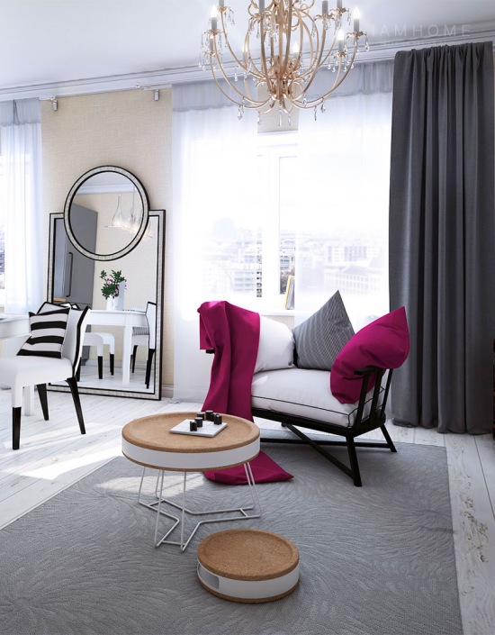 Duże stojące lustro w salonie,okrągłe nowoczesne stoliki kawowe na metalowych podporach,drewniany fotel z pledem i poduchą w kolorze fuksji i szare zasłony w eklektycznym salonie