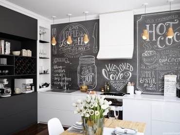 Białe i czarne szafki kuchenne wprowadzają do wnętrza elegancki charakter. Prostota skandynawskiego stylu zapewnia ład...
