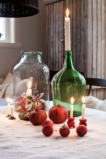 Butle, słoje i dekoracje z owoców na światecznym stole