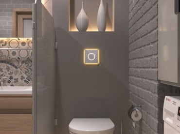 Łazienka jest nowoczesna i ma dekoracyjne podświetlenie w wielu miejscach, Ciemny kolor dodaje wnętrzu elegancji.