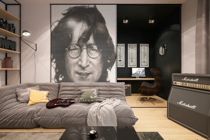 Portret Johny Lennona  na ścianie przesuwnej w  salonie z kącikiem biurowym