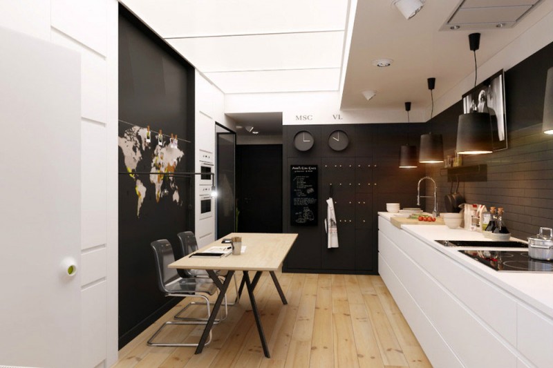 Czarne ściany w białej kuchni z drewnianą podłogą