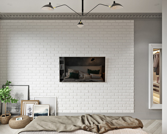Białe cegły na ścianie telewizyjnej w sypialni