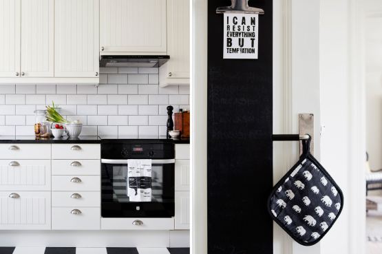 Glazura  biała cegiełka na ścianie w skandynawskiej kuchni z czarną tablicą